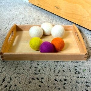 Felt Montessori balls for wooden play boxes